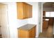 Kitchen nook featuring wood cabinets, granite countertop, and white trim at 1083 E Jade Dr, Chandler, AZ 85286