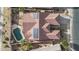 Aerial view of the home, pool, backyard, and solar panels at 11122 N 165Th Ave, Surprise, AZ 85388