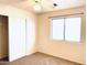 Neutral bedroom with window and closet with standard fixtures at 1133 N Florence Dr, Chandler, AZ 85226