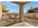 This backyard patio is shaded with desert landscaping and hardscape at 11616 N Saguaro Blvd # 2, Fountain Hills, AZ 85268