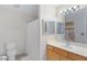 A bright and clean bathroom with a white shower curtain and wood vanity at 11616 N Saguaro Blvd # 2, Fountain Hills, AZ 85268