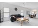 The bright living room has modern décor, light-colored walls and carpet, and lots of natural light at 11616 N Saguaro Blvd # 2, Fountain Hills, AZ 85268