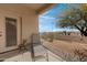 Cozy patio with seating, complemented by desert landscaping and hardscape at 11616 N Saguaro Blvd # 2, Fountain Hills, AZ 85268