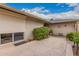 Secluded outdoor patio with a roller shade on the window and ample space for seating at 12810 W Ashwood Dr, Sun City West, AZ 85375