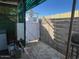 Fenced backyard with a patio area, showing a classic outdoor laundry setup at 13229 N 19Th Pl, Phoenix, AZ 85022