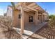 Covered patio with a pergola and view of the desert landscaping at 14314 W Pecos Ln, Sun City West, AZ 85375