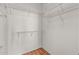 Spacious walk-in closet equipped with ample wire shelving for organization at 14314 W Pecos Ln, Sun City West, AZ 85375