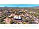 Aerial view of property, in a community of houses with pools in a desert landscape at 14925 E Morning Vista Ln, Scottsdale, AZ 85262