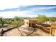 Backyard showing desert landscaping, block home, metal fences, and a view of the mountains at 14925 E Morning Vista Ln, Scottsdale, AZ 85262