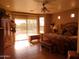 Serene bedroom featuring a sliding glass doors to patio and ceiling fan at 14925 E Morning Vista Ln, Scottsdale, AZ 85262