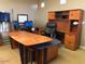 Spacious office featuring a desk with storage and large executive chair at 14925 E Morning Vista Ln, Scottsdale, AZ 85262