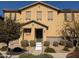 Traditional two-story home featuring symmetrical design, desert landscaping, and a welcoming front entrance at 16648 W Jenan Dr, Surprise, AZ 85388