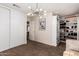 Bedroom room featuring a modern light fixture and a closet with shelving at 1735 W Wildwood Dr, Phoenix, AZ 85045