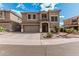 Two-story home with a neutral color scheme, front yard landscaping, and an attached two-car garage at 1735 W Wildwood Dr, Phoenix, AZ 85045