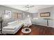 Stylish living room featuring wood floors, modern furnishings, and ample natural light at 1735 W Wildwood Dr, Phoenix, AZ 85045