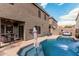 Inviting backyard features a pool and outdoor lounge area at 1735 W Wildwood Dr, Phoenix, AZ 85045