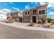 Street view of two houses showcasing desert landscaping, two-car garages, and neutral color schemes at 1735 W Wildwood Dr, Phoenix, AZ 85045