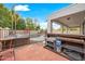 Backyard with built-in bar, pool, and lounge area, perfect for entertaining guests in style at 17771 W Caribbean Ln, Surprise, AZ 85388