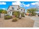 Attractive home with desert landscaping, a driveway, and a two-car garage in a residential area at 17771 W Caribbean Ln, Surprise, AZ 85388