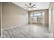 Bright bedroom featuring neutral walls, lots of natural light, and a ceiling fan at 18097 W Santa Alberta Ln, Goodyear, AZ 85338