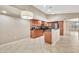 Traditional kitchen with wood cabinets, granite countertops, and stainless steel appliances at 18097 W Santa Alberta Ln, Goodyear, AZ 85338