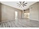 Spacious living room with neutral paint and lots of natural light at 18097 W Santa Alberta Ln, Goodyear, AZ 85338