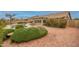 Secluded backyard with a swimming pool, patio furniture, and privacy landscaping at 18730 N 89Th Ave, Peoria, AZ 85382