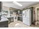 Functional kitchen featuring modern appliances, plenty of counter space, and ample natural light at 19503 N 142Nd Dr, Sun City West, AZ 85375