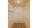 Walk in closet with carpet flooring and metal shelving and ample storage options at 19820 N 13Th Ave # 241, Phoenix, AZ 85027