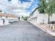 Exterior view of community with parking and row of townhomes at 19820 N 13Th Ave # 241, Phoenix, AZ 85027