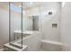 A modern bathroom with a glass shower and stylish tile work and double vanity at 21052 N 58Th St, Phoenix, AZ 85054