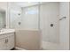 Modern bathroom with a glass shower enclosure and sleek fixtures exudes luxury at 21052 N 58Th St, Phoenix, AZ 85054