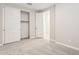 Neutral bedroom features carpet flooring, closet, and interior door at 21052 N 58Th St, Phoenix, AZ 85054