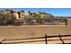 A backyard view with an outdoor fence that surrounds the new residential area at 21056 N 58Th St, Phoenix, AZ 85054