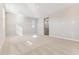 Neutral bedroom featuring plush carpeting, recessed lighting, and view of the ensuite bathroom at 21074 N 58Th St, Phoenix, AZ 85054