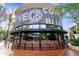 Unique circular restaurant building with large windows, visible interior design, and modern architectural elements at 21074 N 58Th St, Phoenix, AZ 85054