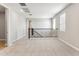 Open bonus room with carpet, natural light, and decorative wrought iron railing at 21122 N 58Th St, Phoenix, AZ 85054