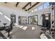 Well-lit gym with ceiling beams and several large windows at 21122 N 58Th St, Phoenix, AZ 85054