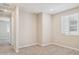 Neutral bedroom showcases a window with blinds and carpet flooring at 21126 N 58Th St, Phoenix, AZ 85054