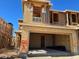 New construction featuring a two-car garage and modern architectural design elements at 21126 N 58Th St, Phoenix, AZ 85054