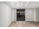 A bright dining room with a sliding glass door that leads outside, and a modern light fixture at 234 N 75Th St # 209, Mesa, AZ 85207