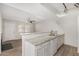 Bright kitchen features white countertops, a double sink and an open layout at 234 N 75Th St # 209, Mesa, AZ 85207