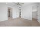 Spacious bedroom featuring carpet, white walls, and a ceiling fan at 24267 W Gibson Ln, Buckeye, AZ 85326