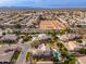 Aerial view highlights the property's lush backyard, pool and premium location in a well-planned community at 2448 E Amber Ct, Gilbert, AZ 85296