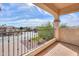 A view from the balcony shows the neighborhood and blue skies at 2448 E Amber Ct, Gilbert, AZ 85296