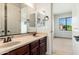 Bathroom with a double sink vanity and neutral color palette at 2448 E Amber Ct, Gilbert, AZ 85296