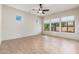 Bonus room featuring wood-look tile floors, neutral walls and ample natural light at 2448 E Amber Ct, Gilbert, AZ 85296