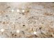 Close-up of granite countertop featuring a speckled pattern with warm brown, white, and tan hues at 2448 E Amber Ct, Gilbert, AZ 85296