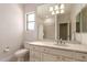 Bathroom featuring double vanity and shower at 2467 E Page Ave, Gilbert, AZ 85234