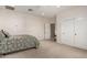 Bedroom featuring carpet, ceiling fan, and closet at 2467 E Page Ave, Gilbert, AZ 85234